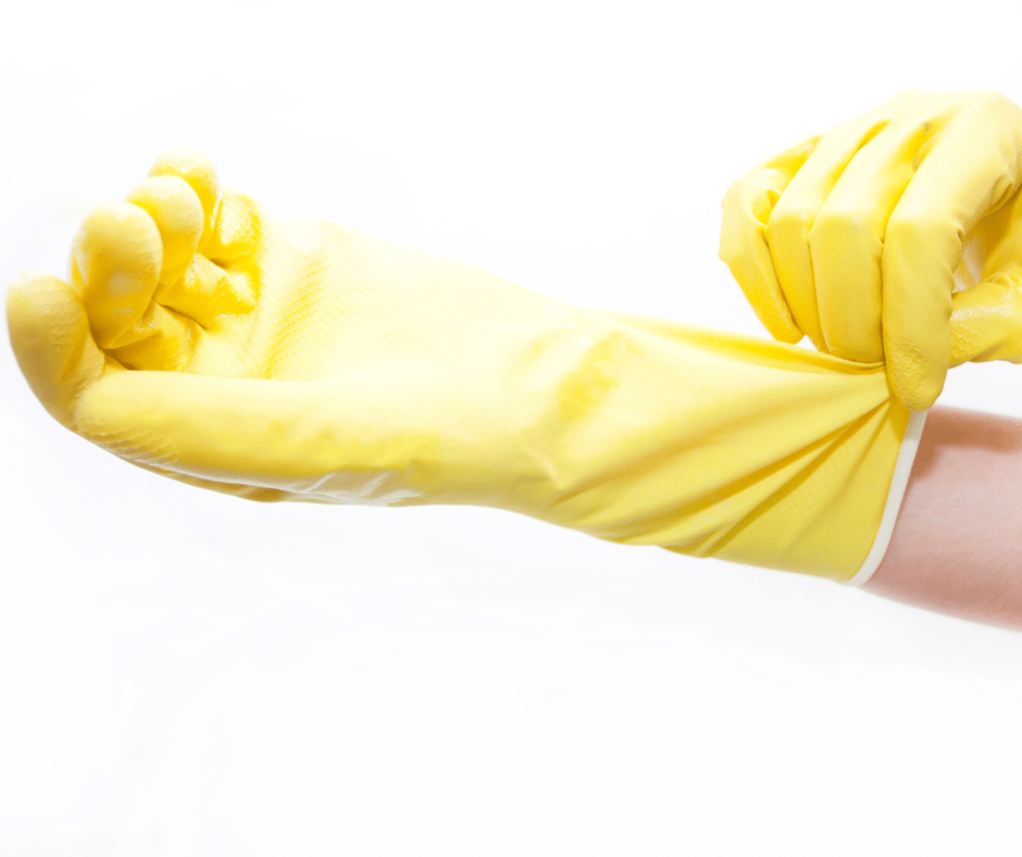 removing pet hair with rubber gloves