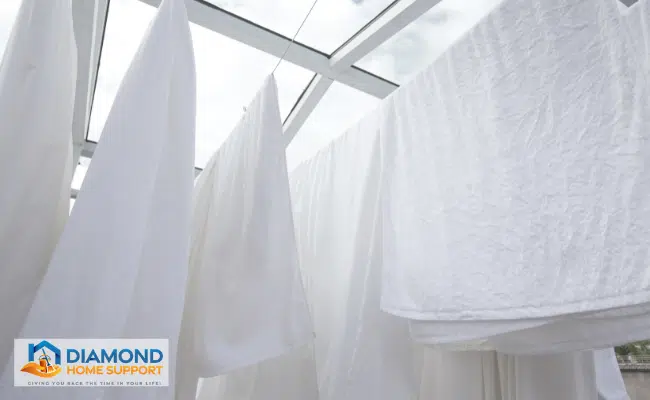 how to stop clothes from smelling damp when indoor drying