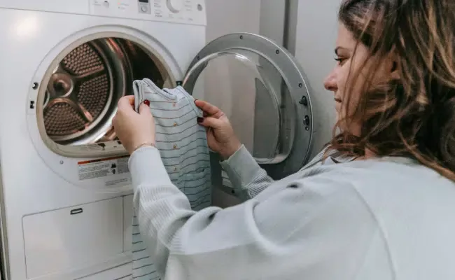 should you wash your clothes inside out
