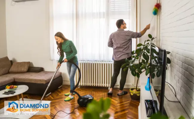 women and men cleaning